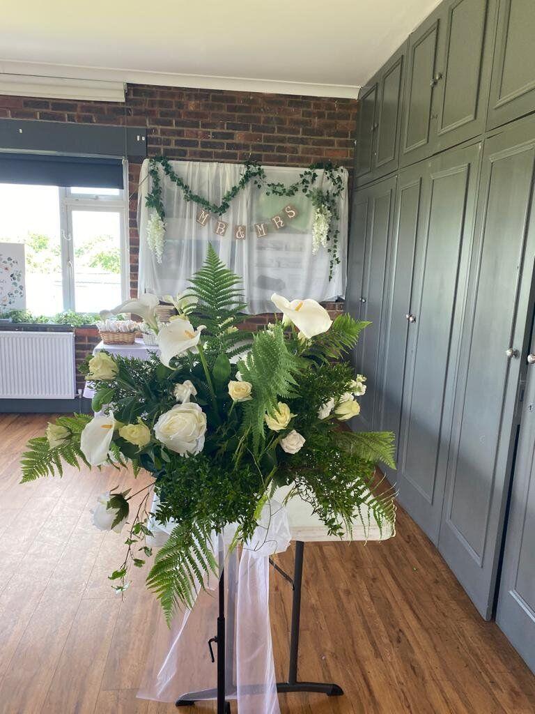 Wedding setup with floral arch